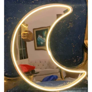 a neon light in the shape of moon. Neon Light Moon Selfie Mirror