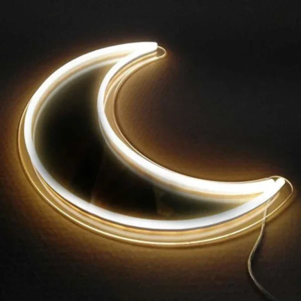 a neon light in the shape of moon