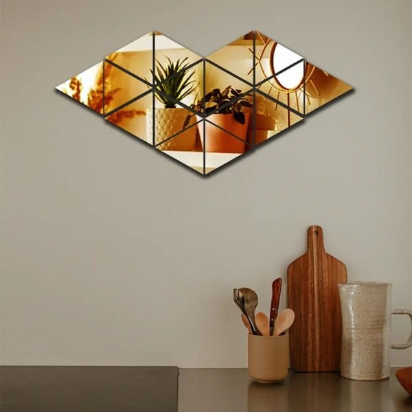 A acrylic mirrors hang on the wall, reflecting the frames of other mirrors.