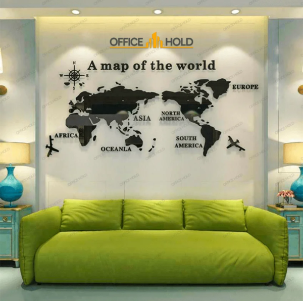 a couch near the wall and map of world on the wall for wall decoration