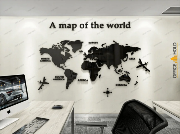 a chair and lcd near the wall and map of world on the wall for wall decoration