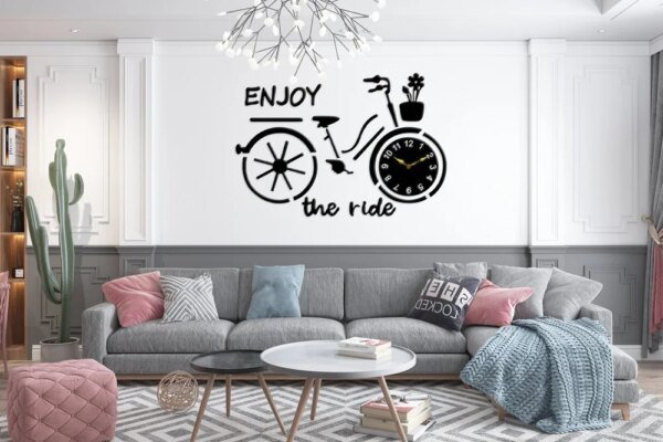 a cycle style clock on the wall and text written on the wall for wall decoration. Premium Cycle Wall Clock