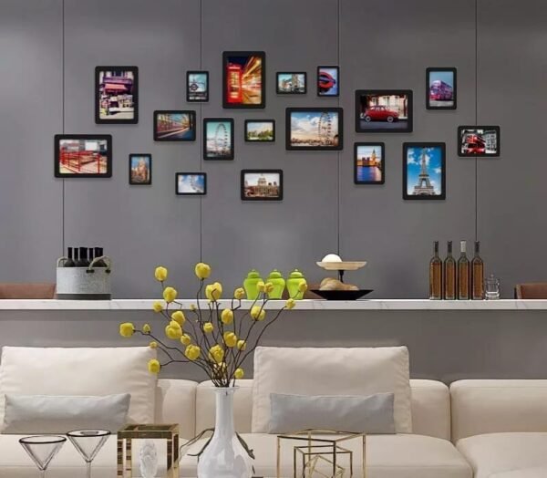 many sizes frames with images on the wall