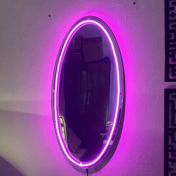 neon selfie mirror on the wall