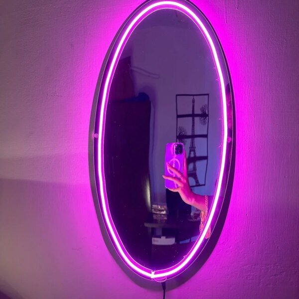 neon selfie mirror on the wall