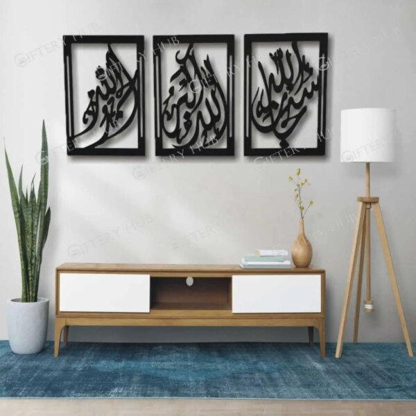 three black color frames on the wall