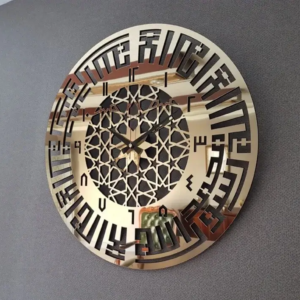 a golden color clock with the first kalima on the wall. First Kalima Wall Clock