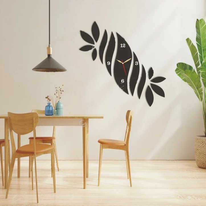 a clock on the wall and three chairs and table. Stylish Leaf Wooden Wall Clock